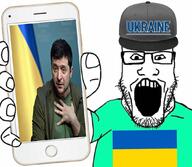 arm baseball_cap clothes country flag glasses hand hat holding_object holding_phone iphone irl open_mouth soyjak stubble subvariant:phoneplier subvariant:phoneplier_vertical text tshirt ukraine variant:markiplier_soyjak volodymyr_zelenskyy // 1080x938 // 111.1KB