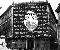 benito_mussolini building duce fascism glasses history irl_background italy looking_at_you propaganda si soyjak stubble variant:israeli_soyjak // 500x417 // 156.7KB